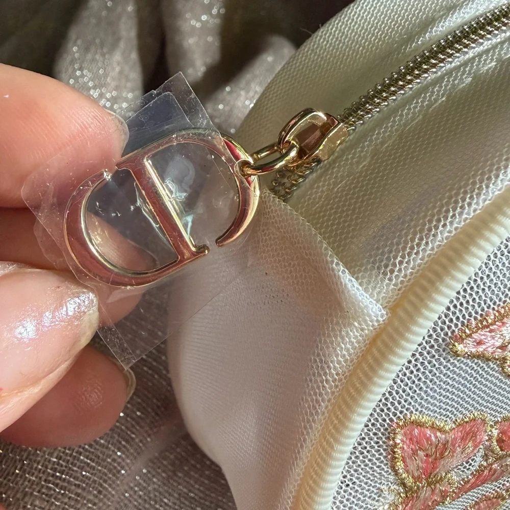 Dior Cream Round Cosmetic Pouch with Pink & Gold Butterfly Embroidery - Picture 4 of 10